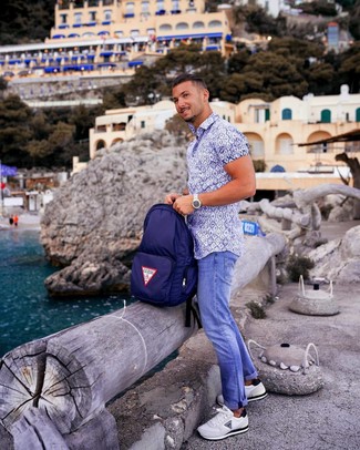 Men's White and Blue Print Short Sleeve Shirt, Blue Jeans, White Athletic Shoes, Navy Canvas Backpack