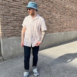 Men's White and Red Vertical Striped Short Sleeve Shirt, Navy Jeans, Grey Athletic Shoes, Blue Denim Bucket Hat