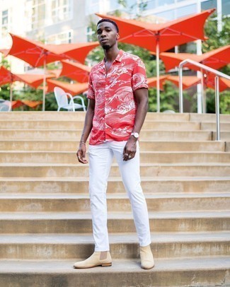 Red and White Print Short Sleeve Shirt Outfits For Men: One of the coolest ways for a man to style out a red and white print short sleeve shirt is to wear it with white jeans in a laid-back getup. Balance out your ensemble with a more elegant kind of footwear, such as these beige suede chelsea boots.