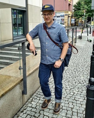 Men's Blue Chambray Short Sleeve Shirt, Navy Jeans, Dark Brown Chunky Leather Derby Shoes, Navy Canvas Messenger Bag