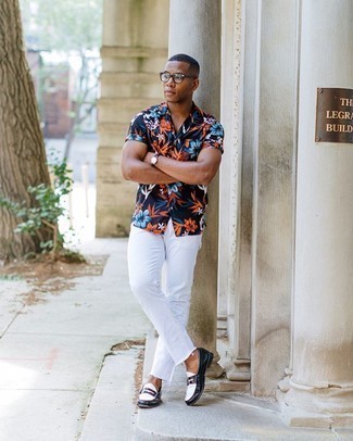 Red Watch Outfits For Men: Make a navy floral short sleeve shirt and a red watch your outfit choice to get a relaxed and absolutely dapper look. For extra fashion points, complete your look with a pair of black and white leather loafers.