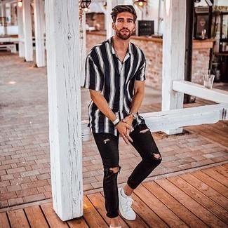 Men's Navy and White Vertical Striped Short Sleeve Shirt, Black Ripped Jeans, White Canvas Low Top Sneakers, Silver Watch