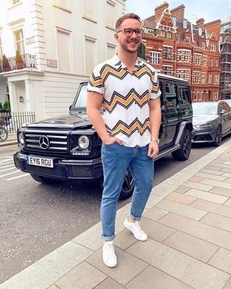 White Chevron Short Sleeve Shirt Outfits For Men: If the situation allows casual style, rock a white chevron short sleeve shirt with blue jeans. If you're on the fence about how to round off, add a pair of white canvas low top sneakers to the equation.