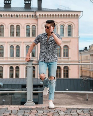 Black Print Short Sleeve Shirt Outfits For Men: A black print short sleeve shirt and light blue ripped jeans are great menswear essentials that will integrate perfectly within your day-to-day styling arsenal. Beige canvas slip-on sneakers are a simple way to add a little kick to the outfit.