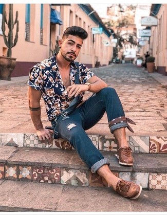 Navy and White Floral Shirt Outfits For Men: For a casual ensemble with an edgy spin, make a navy and white floral shirt and navy denim overalls your outfit choice. Give a different twist to an otherwise straightforward outfit by wearing a pair of brown leather low top sneakers.