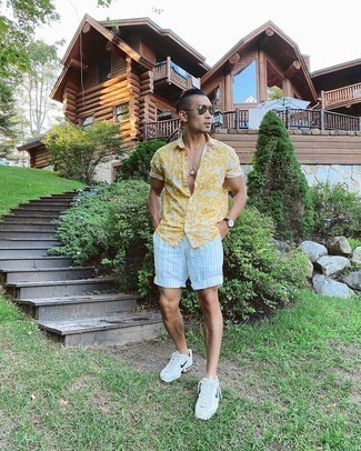 Men's Yellow Print Short Sleeve Shirt, White Vertical Striped Shorts, White and Navy Athletic Shoes, Olive Sunglasses