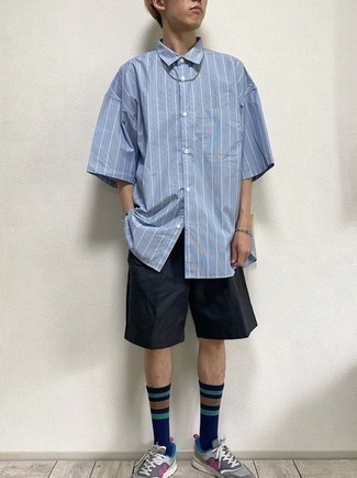 Light Blue Vertical Striped Short Sleeve Shirt Outfits For Men: A light blue vertical striped short sleeve shirt and black shorts will bring serious style to your daily casual collection. You know how to add a more relaxed feel to this look: grey athletic shoes.