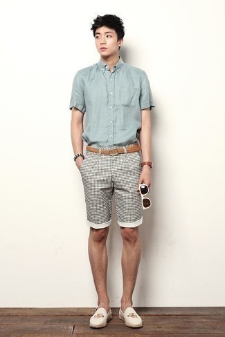 Light Blue Chambray Short Sleeve Shirt Outfits For Men: This pairing of a light blue chambray short sleeve shirt and white and black shorts is the perfect base for a multitude of dapper looks. Add a pair of white embroidered canvas espadrilles to the mix and ta-da: the ensemble is complete.