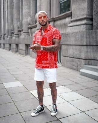 Red Paisley Short Sleeve Shirt Outfits For Men: Showcase your chops in menswear styling by teaming a red paisley short sleeve shirt and white shorts for a casual combination. Rounding off with black print canvas high top sneakers is the most effective way to inject a hint of stylish effortlessness into this ensemble.