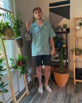 Black Denim Shorts Outfits For Men: Pair a mint embroidered short sleeve shirt with black denim shorts to create an incredibly sharp and modern-looking relaxed casual outfit. A pair of white canvas low top sneakers looks perfect here.