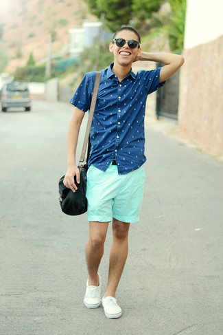 Navy and White Print Short Sleeve Shirt Outfits For Men: This pairing of a navy and white print short sleeve shirt and mint shorts is put together and yet it looks casual and apt for anything. A pair of white low top sneakers will be a welcome addition for this ensemble.