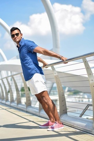 Navy Paisley Short Sleeve Shirt Outfits For Men: If you'd like take your casual style game to a new level, try teaming a navy paisley short sleeve shirt with white shorts. Introduce a pair of hot pink canvas low top sneakers to the equation and the whole look will come together.