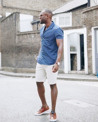 Brown Leather Low Top Sneakers Outfits For Men: This casual pairing of a blue vertical striped short sleeve shirt and white shorts is a tested option when you need to look sharp in a flash. Brown leather low top sneakers pull the outfit together.