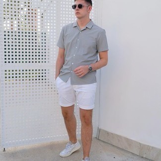 White and Blue Shorts Outfits For Men: If you don't like trying too hard combinations, dress in a white and black vertical striped short sleeve shirt and white and blue shorts. Complement this look with white leather low top sneakers for extra fashion points.