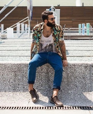 Multi colored Short Sleeve Shirt Outfits For Men: This combo of a multi colored short sleeve shirt and blue jeans is proof that a safe casual outfit doesn't have to be boring. You could follow a more elegant route in the shoe department by finishing off with dark brown leather derby shoes.
