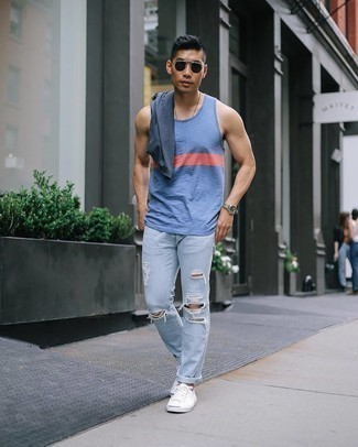 Blue Print Tank Outfits For Men: If you’re a jeans-and-a-tee kind of guy, you'll like this straightforward pairing of a blue print tank and light blue ripped jeans. To give your overall ensemble a more refined finish, why not complement this getup with a pair of white canvas low top sneakers?