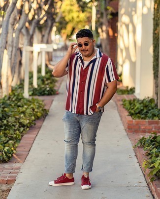 Men's White and Red and Navy Vertical Striped Short Sleeve Shirt, White Tank, Light Blue Ripped Jeans, Red Canvas Low Top Sneakers
