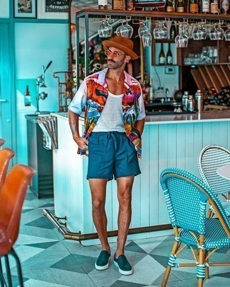 White Horizontal Striped Tank Outfits For Men: This street style combo of a white horizontal striped tank and blue shorts can only be described as outrageously dapper. Balance your look with a sleeker kind of shoes, such as these teal canvas slip-on sneakers.