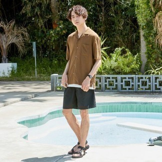 Tan Short Sleeve Shirt Outfits For Men: Want to inject your wardrobe with some laid-back dapperness? Go for a tan short sleeve shirt and dark green shorts. For something more on the daring side to finish your ensemble, throw a pair of black canvas sandals into the mix.