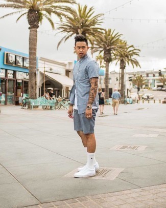 Light Blue Print Shorts Outfits For Men: Marry a light blue print short sleeve shirt with light blue print shorts for a seriously stylish, laid-back ensemble. When not sure about what to wear in the shoe department, complete this look with white canvas low top sneakers.