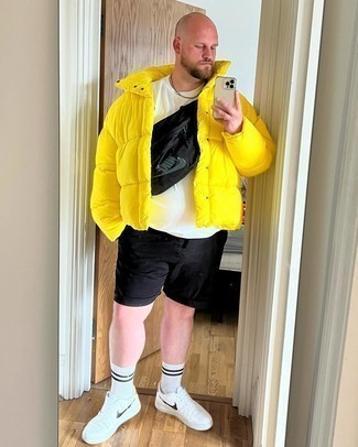 Men's White and Black Leather Low Top Sneakers, Black Shorts, White Crew-neck T-shirt, Mustard Puffer Jacket