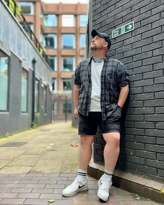 Men's White and Black Leather Low Top Sneakers, Black Shorts, White Crew-neck T-shirt, Navy Plaid Short Sleeve Shirt