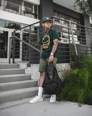 Men's Olive Shorts, White and Black Leather Low Top Sneakers, Black Canvas Backpack, Dark Green Print Baseball Cap