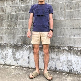 1200+ Cold Weather Outfits For Men: For a look that's very straightforward but can be modified in a multitude of different ways, rock beige shorts. For something more on the daring side to finish off this look, complement this ensemble with tan suede sandals.