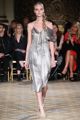 A silver cami dress? This is easily a wearable getup that anyone could work on a daily basis. If not sure about the footwear, go with a pair of silver leather heeled sandals.