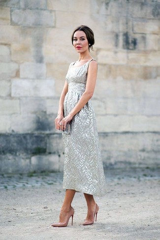500+ Hot Weather Outfits For Women: Perfect the effortlessly stylish getup in a silver midi dress. Add a pair of tan leather pumps to the equation et voila, this outfit is complete.