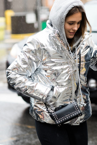 Silver Puffer Jacket Outfits For Women: If you want take your casual style game up a notch, consider wearing a silver puffer jacket and black jeans.