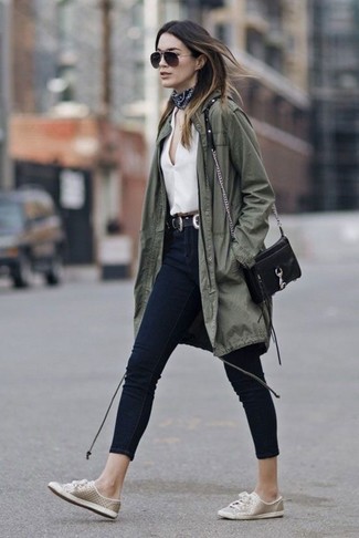 Women's Beige Leather Low Top Sneakers, Black Skinny Jeans, White Button Down Blouse, Olive Fishtail Parka