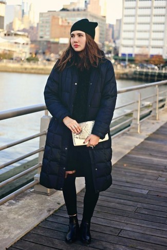 Women's Black Leather Ankle Boots, Black Ripped Skinny Jeans, Navy Cable Sweater, Navy Puffer Coat