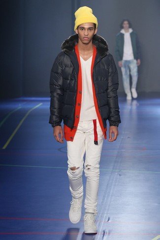 Men's White Low Top Sneakers, White Ripped Skinny Jeans, Red Cardigan, Black Puffer Jacket
