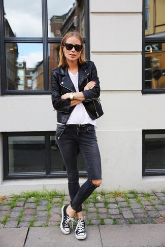 Women's Black and White Canvas Low Top Sneakers, Charcoal Ripped Skinny Jeans, White Crew-neck T-shirt, Black Leather Biker Jacket