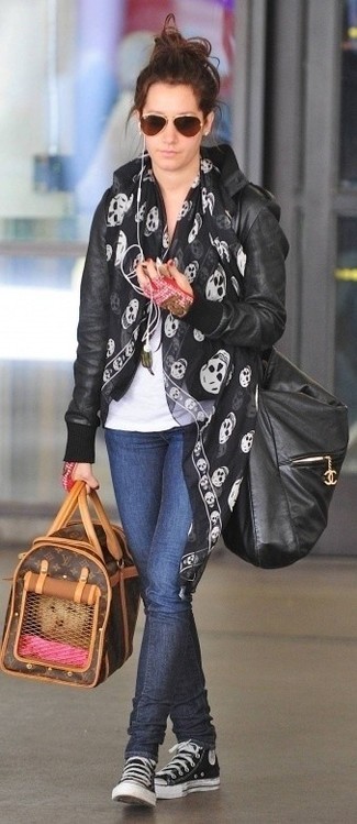 Sandra Bullock wearing Black and White Canvas High Top Sneakers, Navy Skinny Jeans, White Crew-neck T-shirt, Black Leather Bomber Jacket