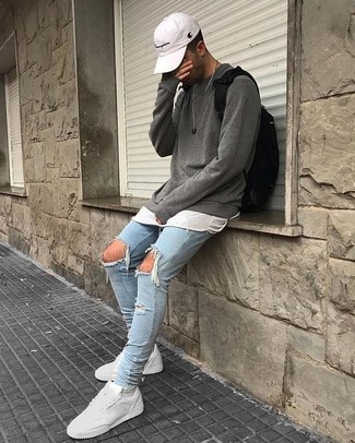 Men's White Leather Low Top Sneakers, Light Blue Ripped Skinny Jeans, White Crew-neck T-shirt, Grey Crew-neck Sweater