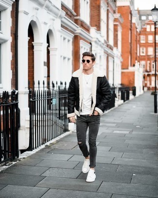 Men's White and Black Leather Low Top Sneakers, Charcoal Ripped Skinny Jeans, White Crew-neck T-shirt, Black and White Shearling Jacket