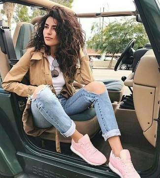 Women's Pink Suede Low Top Sneakers, Light Blue Ripped Skinny Jeans, White Crew-neck T-shirt, Tan Trenchcoat
