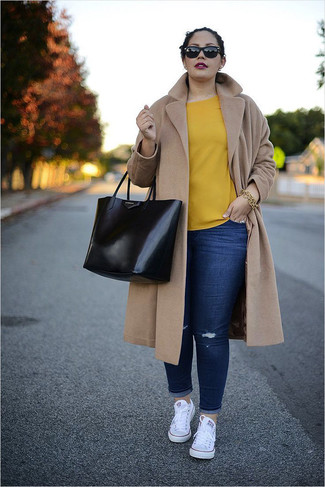 Women's White Canvas Low Top Sneakers, Navy Ripped Skinny Jeans, Yellow Short Sleeve Blouse, Camel Coat