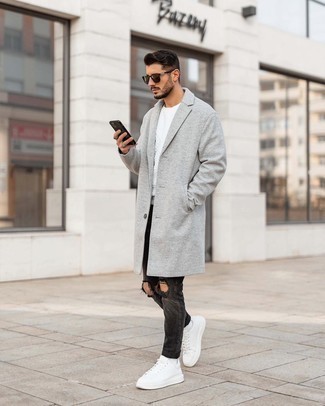 Men's White Leather Low Top Sneakers, Charcoal Ripped Skinny Jeans, White Sweatshirt, Grey Overcoat