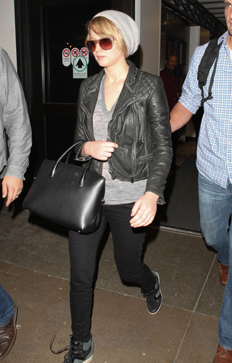 Jennifer Lawrence wearing Black Leather Wedge Sneakers, Black Skinny Jeans, Grey V-neck T-shirt, Black Quilted Leather Biker Jacket