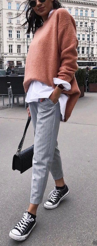 Women's Black and White Canvas Low Top Sneakers, Grey Vertical Striped Skinny Pants, White Button Down Blouse, Tan Oversized Sweater