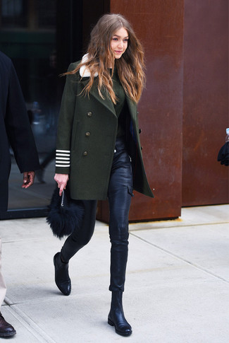Gigi Hadid wearing Black Leather Chelsea Boots, Black Leather Skinny Pants, Dark Green Crew-neck Sweater, Dark Green Coat