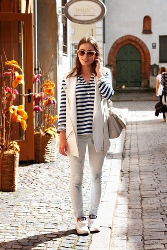 Women's White Low Top Sneakers, White Skinny Pants, White and Navy Horizontal Striped Henley Shirt, White Leather Vest
