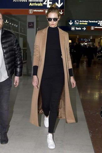 Bella Hadid wearing White Leather Low Top Sneakers, Black Skinny Pants, Black Knit Tunic, Camel Coat