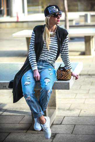 Brown Leopard Suede Bucket Bag Outfits: Wear a black sleeveless coat with a brown leopard suede bucket bag if you seek to look laid-back and cool without trying too hard. Introduce a pair of white leather low top sneakers to the equation to pull the whole thing together.