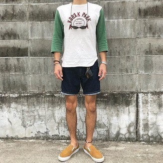 Men's Dark Green Sunglasses, Tan Canvas Slip-on Sneakers, Navy Denim Shorts, White Print Long Sleeve T-Shirt