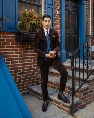 Dark Brown Leather Brogue Boots Outfits: Combining a dark brown suit with a blue cardigan is a great pick for a sharp and classy getup. Finishing with a pair of dark brown leather brogue boots is a fail-safe way to introduce a fun vibe to this look.