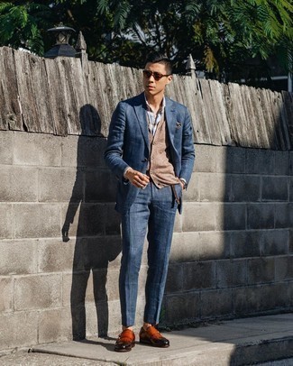 Brown Cardigan Outfits For Men: This classy pairing of a brown cardigan and a blue suit is a favored choice among the fashion-forward gents. The whole outfit comes together when you introduce a pair of tobacco leather double monks to this outfit.
